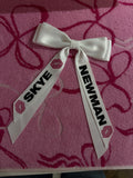 Skye Newman Bow
